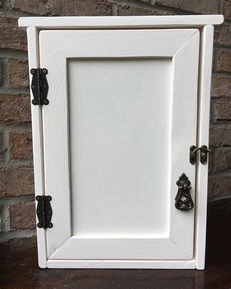 hide unsightly electrical breaker box|concealed electrical panel cover.